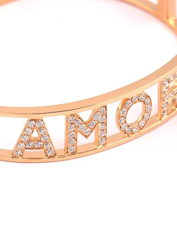 BRACCIALE RIGIDO IN ORO ROSA 18KT SCRITTA AMORE CON DIAMANTI BIANCHI