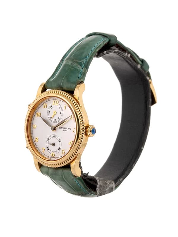 PATEK PHILIPPE TRAVEL TIME 30MM IN ORO GIALLO 18KT REF. 4864J