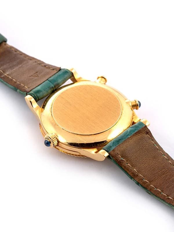 PATEK PHILIPPE TRAVEL TIME 30MM IN ORO GIALLO 18KT REF. 4864J