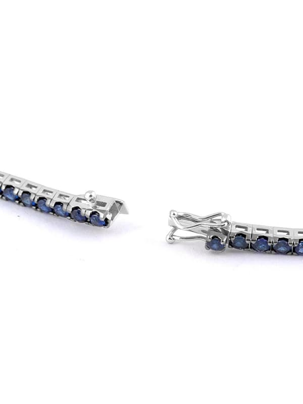 BRACCIALE TENNIS IN ORO BIANCO 18KT CON ZAFFIRI BLU