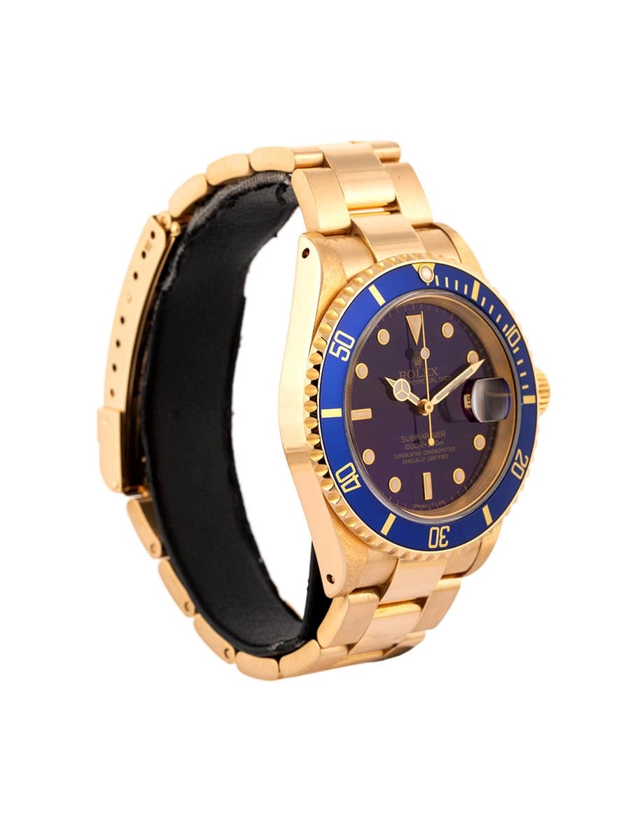 ROLEX SUBMARINER DATE CON SERVICE BLUE DIAL 40MM IN ORO GIALLO 18KT REF. 16618