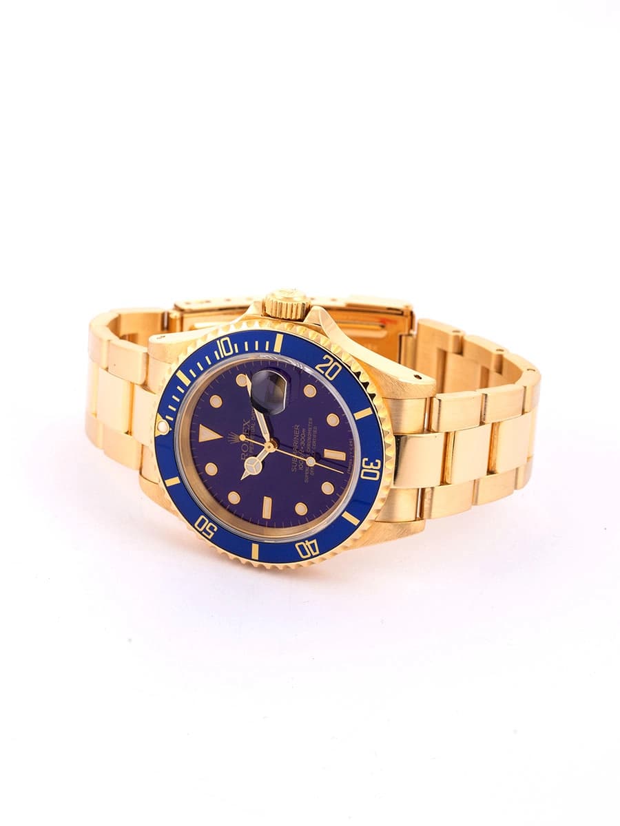 ROLEX SUBMARINER DATE CON SERVICE BLUE DIAL 40MM IN ORO GIALLO 18KT REF. 16618