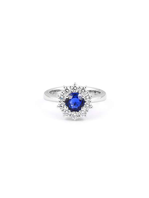 ANELLO IN ORO BIANCO 18KT CON ZAFFIRO TONDO E DIAMANTI