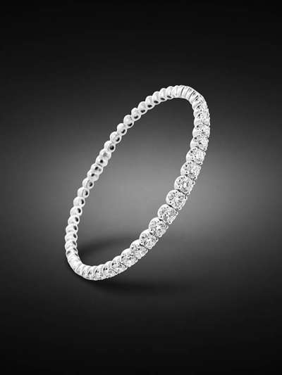 BRACCIALE IN ORO BIANCO 18 KT RIGIDO A SCALARE CON DIAMANTI